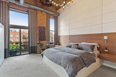 Example of an urban bedroom design in Chicago
