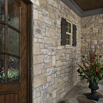 Stone porch and wood shutters