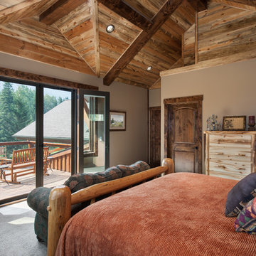 Rustic Timber Frame Home: The Rock Creek Residence - Master Bedroom with Balcony