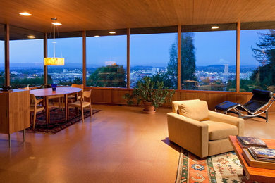 Living room - mid-sized 1950s enclosed and formal cork floor living room idea in Portland with no tv, white walls, a standard fireplace and a stone fireplace