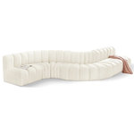 Meridian Furniture - Arc Velvet Upholstered 7-Pc. S-Shaped Modular Sectional, Cream - Give your living room or den the perfect blend of style and versatility with this Arc velvet fabric curved modular Sectional. Part of the Arc modular furniture collection, this Sectional comes upholstered in rich cream velvet fabric and features deep channel tufting that adds a touch of luxury while enhancing comfort and support. A seamless combination of form and function, this chair can be used with other Arc pieces to create a myriad of configurations in your well-curated room.
