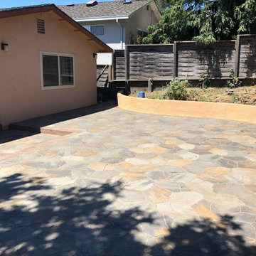 Pavers patio and returning wall and with smooth stucco