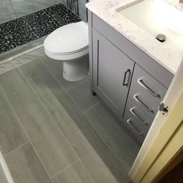 Tub-to-Shower Conversion with Pebble Floor in Edgewood