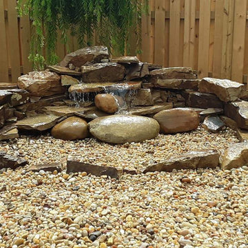 Backyard Landscape Rennovation - Paver Patio, Firepit, Raised Garden Beds, etc.