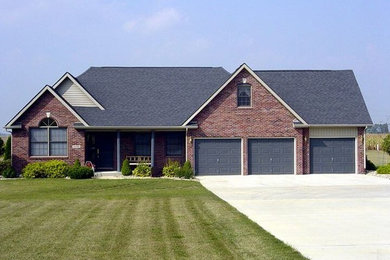 Mid-sized one-story brick exterior home photo in Indianapolis