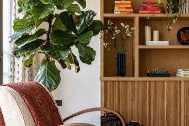 This is an example of a contemporary living room in Other with light hardwood flooring and beige floors.