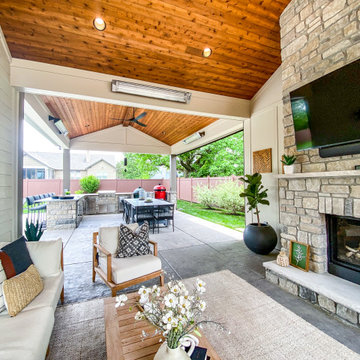 Pool-Side Covered Patio with a Fireplace and Outdoor Kitchen