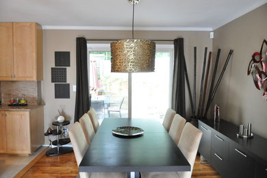 Example of a mid-sized trendy light wood floor kitchen/dining room combo design in Austin with beige walls and no fireplace