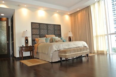Example of an eclectic bedroom design in Miami