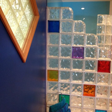 Multi colored glass block wall and diamond shaped window