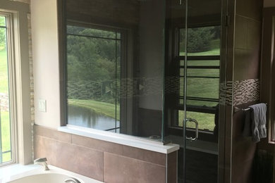 Bathroom - large rustic master brown tile and porcelain tile bathroom idea in New York with beaded inset cabinets, quartzite countertops, a hinged shower door and white countertops
