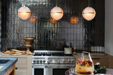 Kitchen - transitional kitchen idea in Cleveland with black backsplash, subway tile backsplash and stainless steel appliances