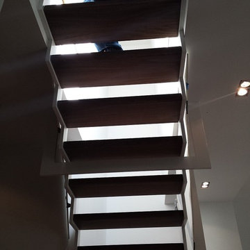 Custom walnut stairs & wet bar Soho- New York, NY