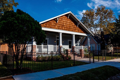 Inspiration for a mid-sized craftsman blue one-story concrete fiberboard exterior home remodel in Houston