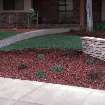 Flowing Lawn and Plantings Extend Across the Front Yard