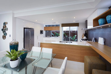 This is an example of a contemporary u-shaped eat-in kitchen in Perth.