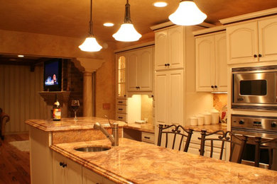 Example of a classic kitchen design in Other