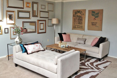 Example of a mid-sized trendy formal and enclosed living room design in Denver with blue walls, no fireplace and no tv