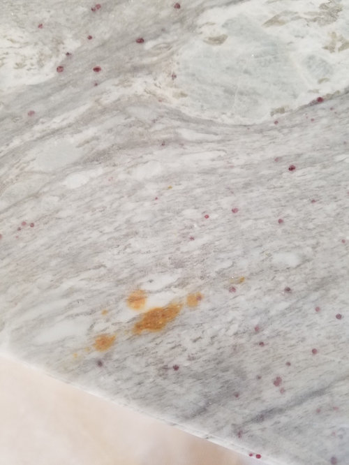 stain on newly installed granite..can it be removed?