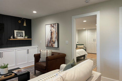 Example of a farmhouse family room design in Grand Rapids