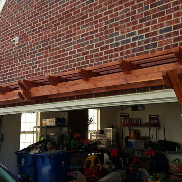 Exterior Shutters and Wall-Mounted Pergola