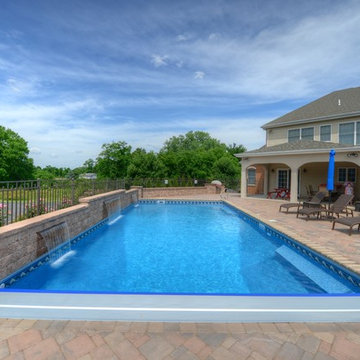 Traditional Pool with Retractable Cover