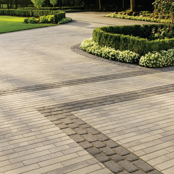 Traditional Curved Driveway with a Sophisticated Inlay Design