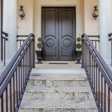 Grand Entryway Framed by Classical Columns and Modern Craftsmanship