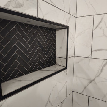Custom Tile Tub Surround with Black Herringbone Mosaics