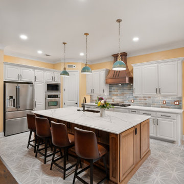 Kitchen Island View Facing Living Room Stone Fireplace Leather Sectional
