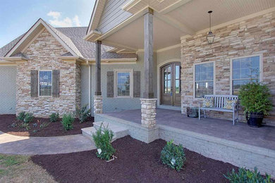 This is an example of a craftsman porch design in Other.