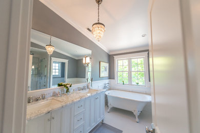 Bathroom - mid-sized farmhouse master white tile and subway tile mosaic tile floor bathroom idea in San Francisco with recessed-panel cabinets, white cabinets, a two-piece toilet, gray walls, an undermount sink and marble countertops