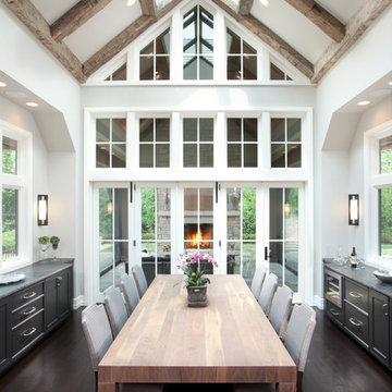 Hand Hewn Timber Trusses on a Vaulted Cathedral Ceiling with Skylight
