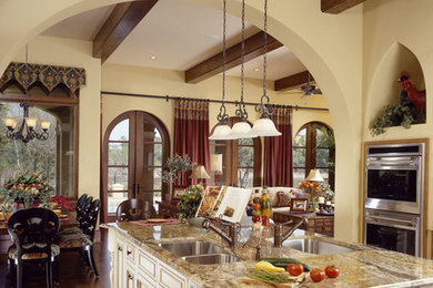 Example of a tuscan kitchen design in Tampa