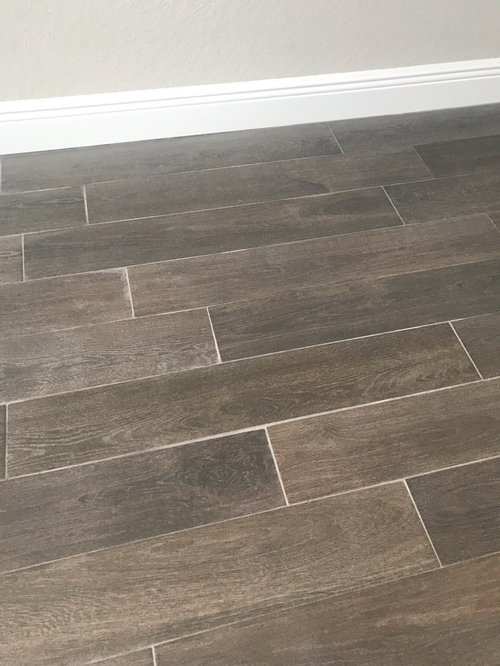Problems with builder around woodlook tile grouting
