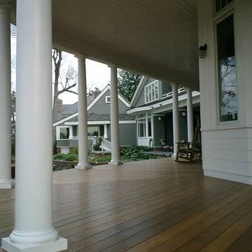 mahogany decking and a gentle curved porch