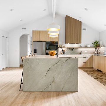 Exquisite slab kitchen with a statement slatted hood