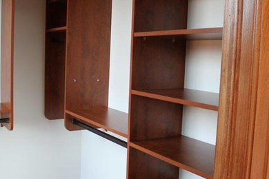 Example of a transitional closet design in New York