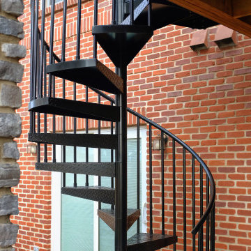 Two-Story Composite Deck With Spiral Aluminum Staircase