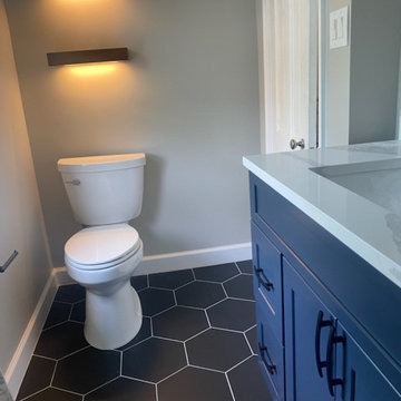 Bathroom Remodeling in Washington DC with Blue cabinet and Quartz countertop