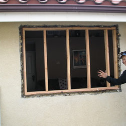 Putting a direct vent fireplace into the living room of a home with no fireplace - Home Improvement