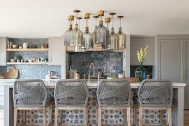 Example of a beach style home bar design in Orange County