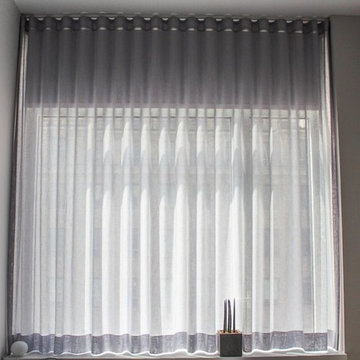 Sheer Drapery & Motorized Blackout Shade