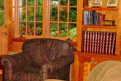 Example of a classic family room design in Boston