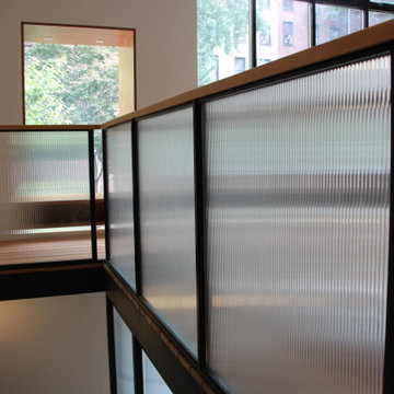Glass and black metal railings