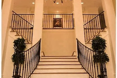 New Orleans style custom split staircase with Iron railings and 5 ft x 4 ft cust