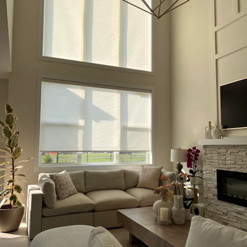 Custom Motorized Roller Shades in a Modern Living Room