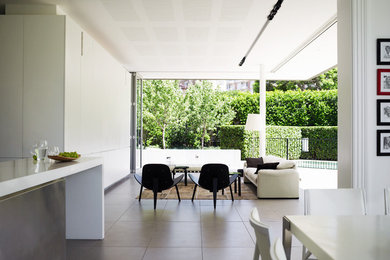 This is an example of a large contemporary sunroom in Sydney with a standard ceiling.