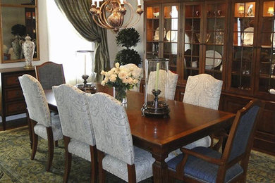 Example of a mid-sized classic dark wood floor enclosed dining room design in Philadelphia with no fireplace and white walls