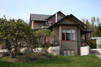 Rustic exterior home idea in Vancouver